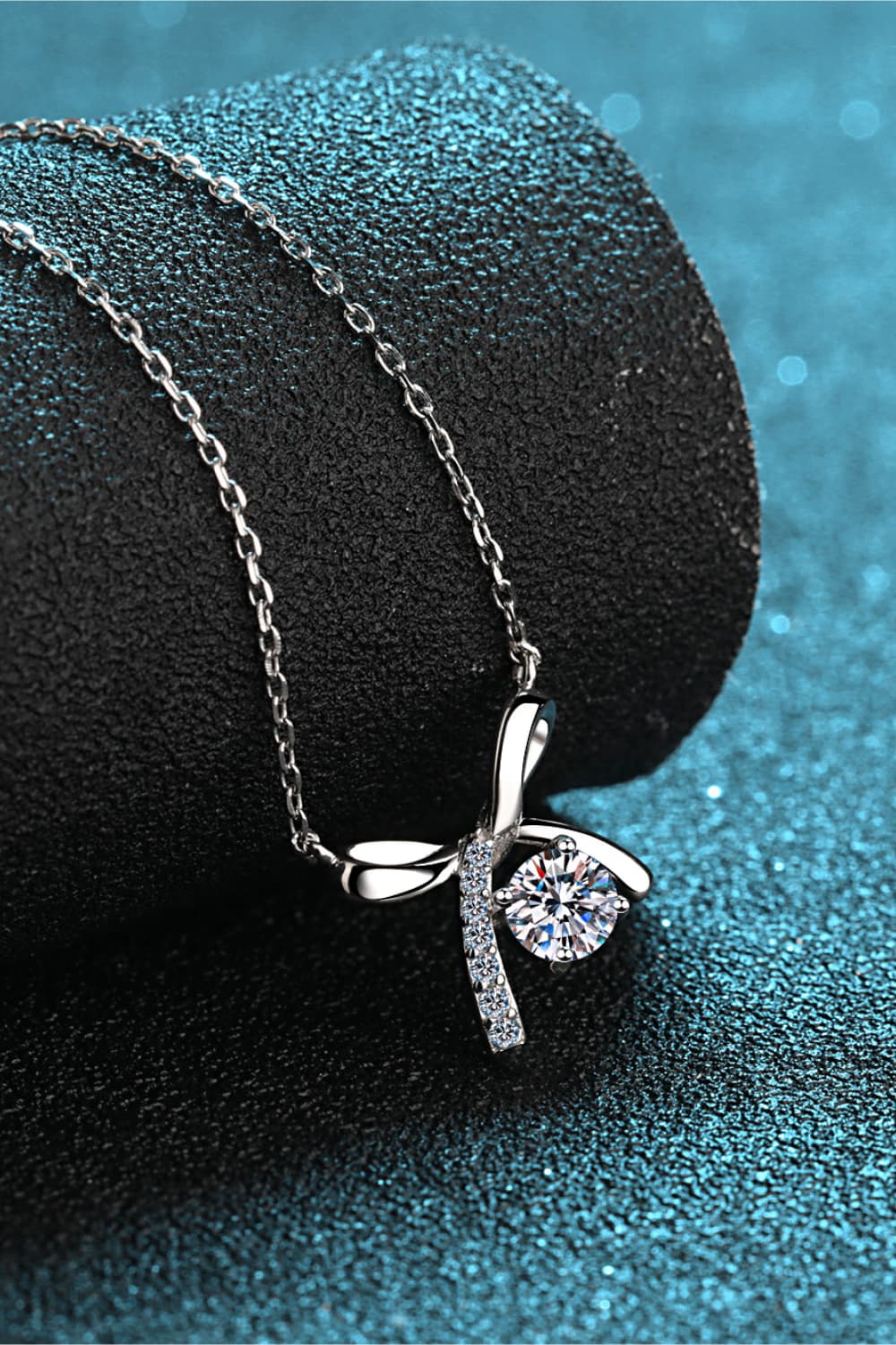 Sophisticated Silver Bow Pendant Necklace